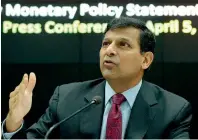  ?? — AFP ?? Indian banks have not passed on the benefits of lower interest rates. Raghuram Rajan hopes they will do so now.