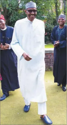  ??  ?? President Buhari at the forecourt lawn of the Abuja House in London