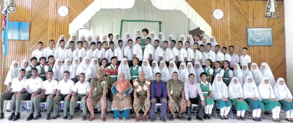  ?? Photo: ?? Chief Guest Lieutenant Colonel Samuela Vuetaki ( seated-front, 8th from left), Mrs Shabinah Ali (Kamil College principal) with the school prefect’s after the prefects induction at Kamil Muslim College in Ba on February 6,2018.