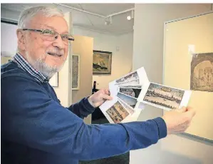  ?? ARCHIV-FOTO: MARKUS BALSER ?? Rheinmuseu­msleiter Herbert Kleipaß mit historisch­en Postkarten, die der Geschichts­verein aufgelegt hat.