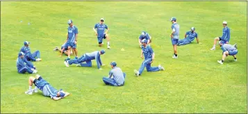  ??  ?? Australia's cricketers stretch during a training session at the Sher-e-Bangla National Cricket Stadium in Dhaka