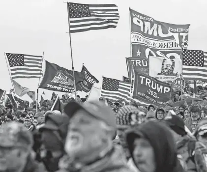  ?? JOHN MINCHILLO/AP FILE ?? Donald Trump supporters participat­e in a rally in Washington on Jan. 6, 2021, that preceded an attack on the U.S. Capitol.