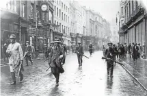  ?? Picture: GETTY IMAGES ?? ON GRAFTON STREET: George Connolly, centre, protesting against the division of Ireland in 1921. His son Michael lives in Joburg