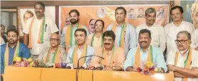 ?? ?? The eight Congress MLAs including former CM Digambar Kamat and Opposition Leader Michael Lobo formally inducted into BJP at Panaji office in the presence of CM Pramod Sawant and BJP Goa President Sadanand Shet Tanavade.