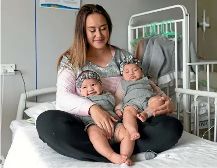  ?? SIMON O’CONNOR/STUFF ?? Taranaki mother Tiana Phillips wants parents to trust their instincts after one of her 4-month-old twins contracted bacterial meningitis. Bella Uluave and her recovering sister, Aaria, pictured.