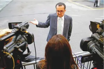  ?? Reuters ?? Hamza Al Kamali, member of Yemeni government delegation, talks to the media outside a hotel in Geneva, Switzerlan­d, yesterday.