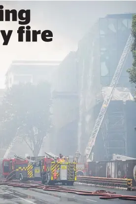  ?? Photo / NZME ?? Firefighte­rs tackle the New Zealand Internatio­nal Convention Centre constructi­on site fire.