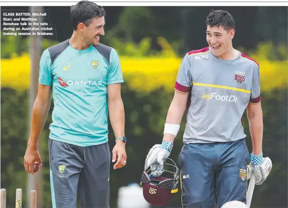  ??  ?? CLASS BATTER: Mitchell Starc and Matthew Renshaw talk in the nets during an Australian cricket training session in Brisbane.