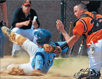  ?? MARK C PSORAS — MEDIANEWS GROUP FILE ?? North Penn’s Eddie Posavec (22) avoids the tag of Perk Valley catcher Donovan Squartino (22) as he scores a run during the 2013playof­fs.