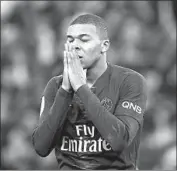  ?? Franck Fife Getty Images ?? KYLIAN MBAPPE is often compared to another French internatio­nal soccer star, Thierry Henry.