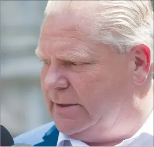  ?? CP PHOTO ?? Ontario Premier-designate Doug Ford says his first act as Ontario premier will be to scrap the province’s cap-andtrade system and challenge federal rules on carbon pricing.