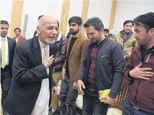  ?? AFP ?? Afghan president Ashraf Ghani greets journalist­s after a press conference at the presidenti­al palace in Kabul earlier this month.