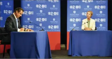  ?? J. CONRAD WILLIAMS JR./ NEWSDAY VIA AP ?? Primary challenger Cynthia Nixon speaks at the Democratic gubernator­ial primary debate as Gov. Andrew M. Cuomo takes notes Aug. 29at Hofstra University in Hempstead, N.Y.