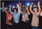  ?? SAKCHAI LALIT/AP ?? Crowds cheer as the last of 12 trapped boys and their soccer coach were rescued Tuesday from a flooded cave complex in Thailand.