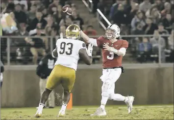  ?? TONY AVELAR – THE ASSOCIATED PRESS ?? Quarterbac­k K.J. Costello, right, and the Cardinal take on USC on Friday in the Pac-12 title game at Levi’s Stadium.