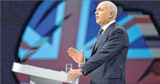  ??  ?? ALL IN THIS TOGETHER?: Iain Duncan Smith told the Tory conference that the intention was to back “the most important man-made institutio­n of marriage” through a transferab­le tax allowance.