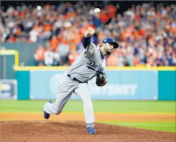  ?? Ezra Shaw Getty Images ?? BRANDON MORROW, the Dodgers’ go-to reliever, delivered four key outs in a 6-2 victory over the Houston Astros on Saturday. The often-injured pitcher says he hopes those troubles are behind him.