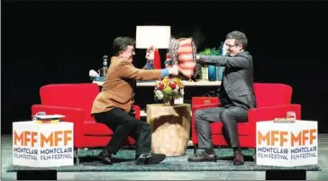  ?? BRYAN THOMAS/THE NEW YORK TIMES ?? Stephen Colbert and John Oliver pillow fight before hosting ‘Wow, That Was Weird: A Post-Election Evening With Stephen Colbert and John Oliver’ at the New Jersey Performing Arts Center in Newark, New Jersey, on Saturday.