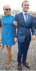  ??  ?? Loving Louis Vuitton and blue: In the inaugurati­on suit that was compared to Melania’s (left), and an LV ensemble for Bastille Day.