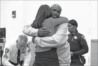  ??  ?? Derrick Deacon, 58, hugs his attorney Rebecca Freedman, at State Supreme Court after being acquitted. (Photo: nypost)