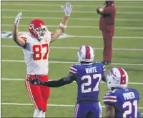  ?? JEFFREY T. BARNES - THE ASSOCIATED PRESS ?? Kansas City Chiefs’ Travis Kelce, left, celebrates his touchdown during the first half of an NFL football game against the Buffalo Bills, Monday, Oct. 19, 2020, in Orchard Park, N.Y.