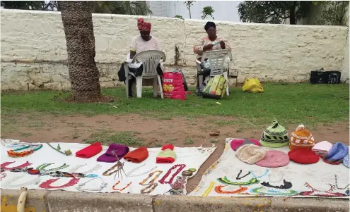  ?? Photos: Jade le Roux ?? Nowethu January and Notemba Makinana are regular bead merchants at the Drostdy Arch. The duo have been beading since the age of 31 when they expressed an interest to get back into their culture. Their story speaks to the extent to which African...