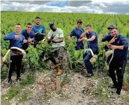  ?? ?? Jermaine Stone and the vineyard team at Chateau La“te Rothschild