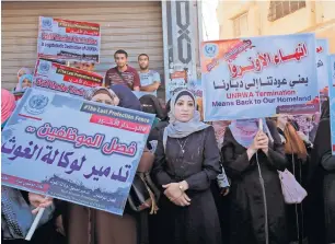  ?? AFP ?? Palestinia­ns take part in a protest against job cuts by unrwA in Gaza City on wednesday. —