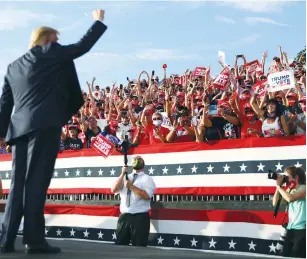  ?? ( Tom Brenners/ Reuters) ?? US PRESIDENT Donald Trump waves to supporters after speaking at a campaign rally in Florida on Friday.