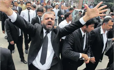  ?? PICTURES: AP ?? A Pakistan lawyer chants slogans during a demonstrat­ion to condemn Quetta’s suiciding bombing, in Lahore, Pakistan.