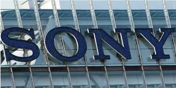  ??  ?? Profit warning: The Sony headquarte­rs building in Tokyo. Sony warned annual profits were likely to see double-digit falls as the coronaviru­s pandemic continues to cloud the forecast. — AFP