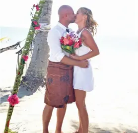  ??  ?? Peter Cooney married partner Nina Boekhoven at the Wailoaloa Beach in Nadi.