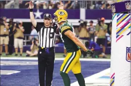  ?? MICHAEL AINSWORTH — THE ASSOCIATED PRESS ?? Packers receiver Jordy Nelson expects to return from a minor back injury this week and perhaps participat­e with teammates in another choreograp­hed touchdown celebratio­n.