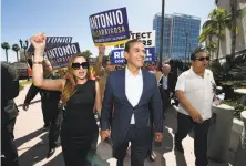  ??  ?? Antonio Villaraigo­sa and wife Patricia Govea, left, at the state Democratic Party’s convention in San Diego, where Gavin Newsom, right, outpaced him in gubernator­ial endorsemen­t votes.