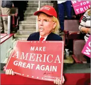  ?? REUTERS ?? A child dressed up as Republican presidenti­al nominee Donald Trump at a campaign event in Hershey, Pennsylvan­ia on Thursday.