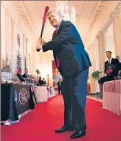  ?? AFP ?? US President Donald Trump takes a swing with a bat from Texas Timber before speaking at a Spirit of America showcase event on small businesses at the White House, in Washington, DC.