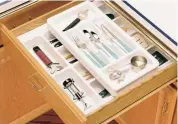  ?? Kitchensou­rce.com ?? A two-tier cutlery drawer organizer allows more room.