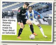  ??  ?? New signing Rolando Aarons made his Town debut on Saturday