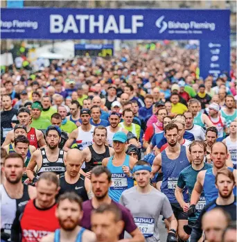  ?? Ben Birchall/ PA Wire ?? Runners at the start of the race during the Bath Half Marathon in 2020