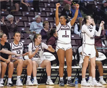  ?? ?? The Missouri State Lady Bears celebrate their win against Brigham Young University on Dec. 20 at Great Southern Bank Arena in Springfiel­d.