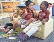  ?? TOM BUSHEY/AP ?? Children enjoy a singalong at the Early Head Start program in Woodbourne, N.Y., on July 23, 2013. Most Head Start teachers who leave for other jobs cite low compensati­on.