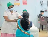  ?? SATISH BATE/HT PHOTO ?? A beneficiar­y gets the Covid-19 vaccine at Rajawadi Hospital on Friday.