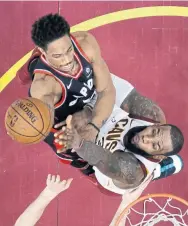  ?? TONY DEJAK/THE ASSOCIATED PRESS ?? Raptor DeMar DeRozan, trying to beat LeBron James of the Cavs to the rim in Cleveland last week, has seen enough franchise lows and is enjoying the highs.