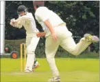  ?? Picture: Steve Crispe FM3988650 ?? Mersham Sports’ David Harman takes on the bowling of Holcombe & Blue Bell Hills’ Tom Day