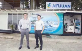  ?? BENING BATUIGAS ?? Air Juan president John Gutierrez (left) and marketing head Paolo Misa at Air Juan’s pre-departure area.