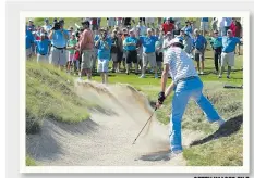  ??  ?? GETTY IMAGES FILE Kelly Kraft hits out of an Erin Hills bunker at the U.S. Amateur Championsh­ip in 2011. The course’s designers predict the bunkers will be a big complaint among golfers at this week’s U.S. Open.