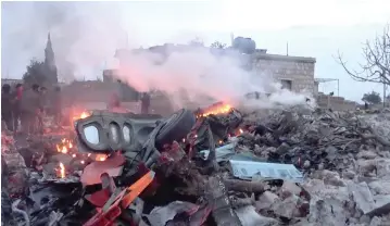  ?? REUTERS ?? THE SCENE SHOWS, what according to Syrian rebels were fires caused by Russian military plane shot down by rebel forces near Idlib, Syria, reportedly on Feb. 3 in this still image obtained from social media.