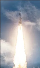  ?? (File Photo/AP/NASA/Chris Gunn) ?? Arianespac­e’s Ariane 5 rocket with NASA’s James Webb Space Telescope onboard lifts off Dec. 25, 2021, at the Guiana Space Center in Kourou, French Guiana.