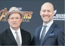  ?? WENN.COM ?? Superheroe­s in their own right, Christophe­r Markus, left, and Stephen McFeely are co-writers of Avengers: Infinity War.