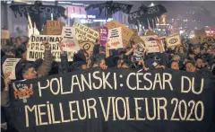  ??  ?? HATED WINNER: Activists hold a banner reading ‘Polanski: Best rapist 2020 award’ outside the Salle Pleyel in Paris as guests arrive for the Cesar Film Awards.